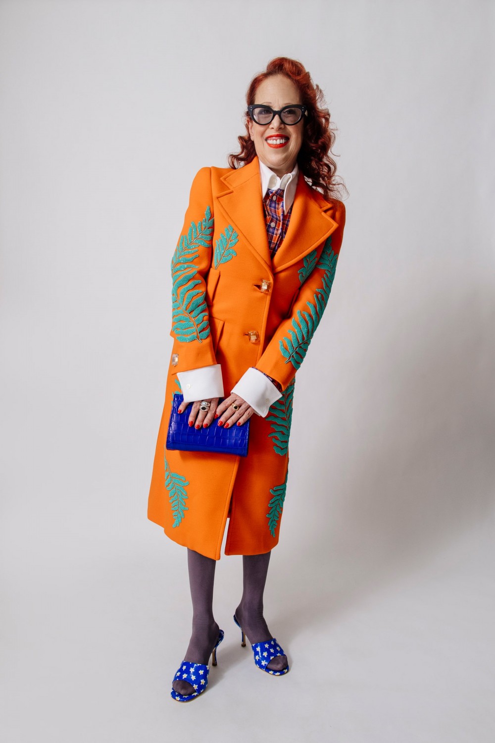 pCathy Paul Marinas former Barneys New York colleague models the Colette mules and a Prada coat that she says is one of...