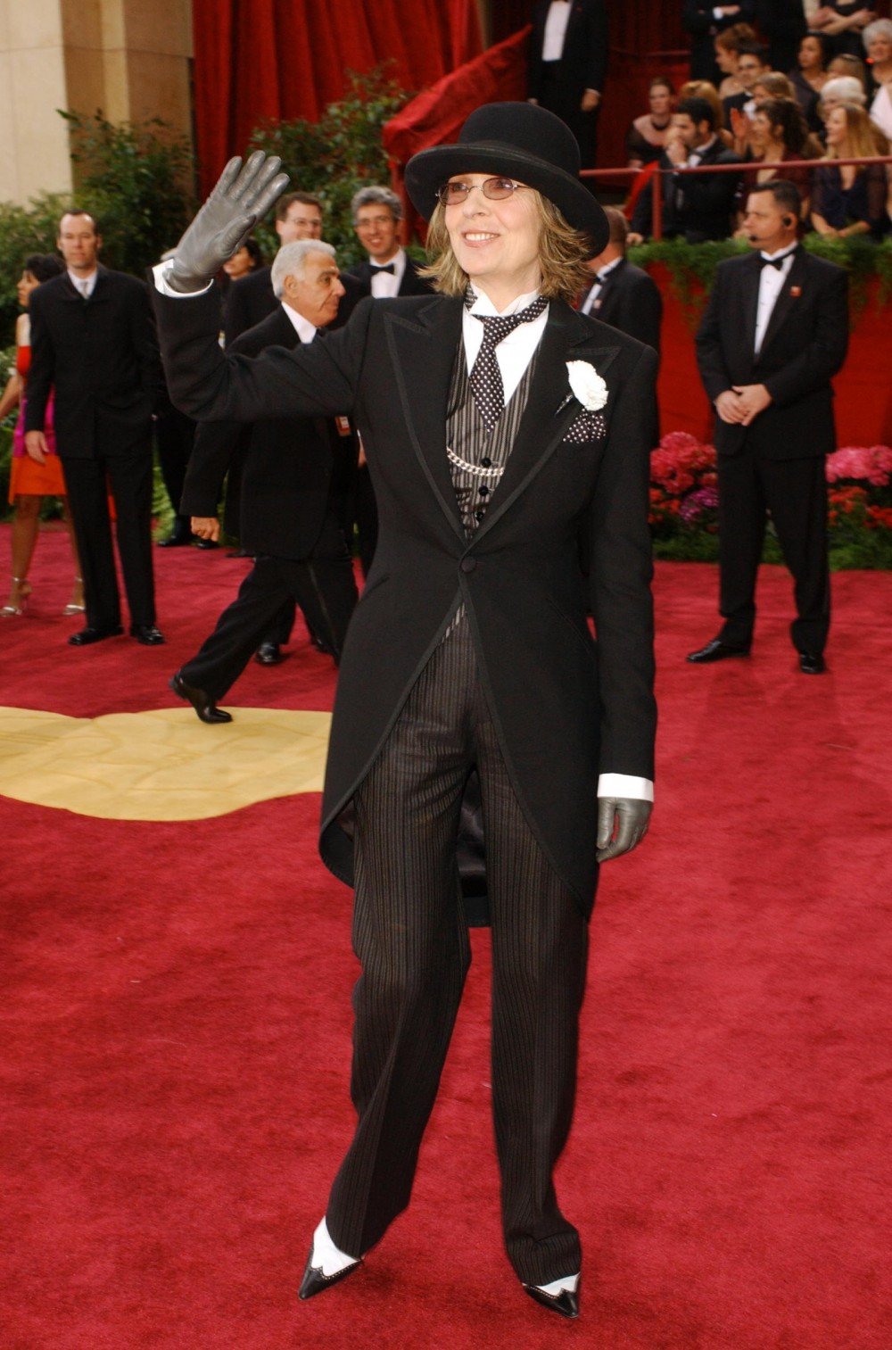 Image may contain Diane Keaton Suit Coat Clothing Overcoat Apparel Human Person Fashion Premiere and Red Carpet