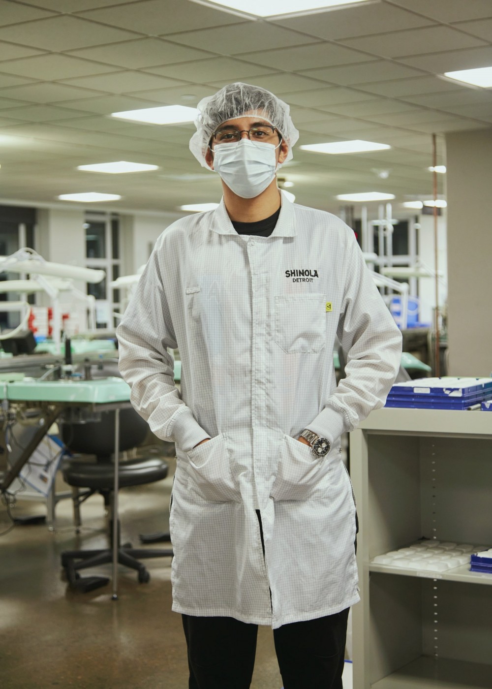 Image may contain Human Person Clothing Apparel Clinic Coat Lab Coat and Lab