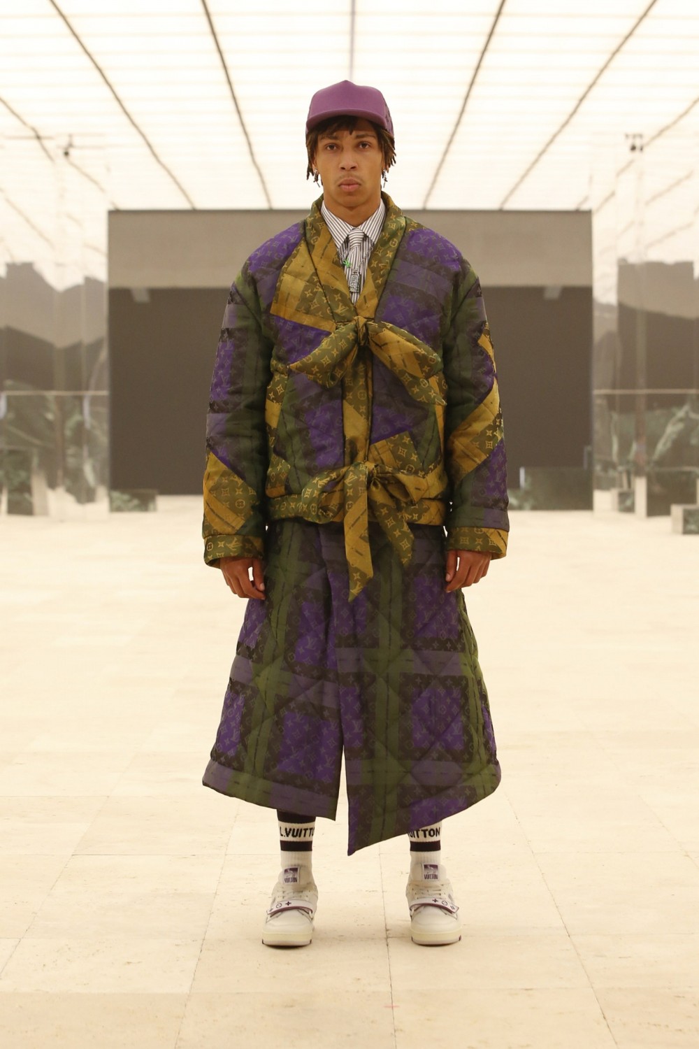 Right off the bat the lead purple and green L.V.monogram trench coat. So sick.