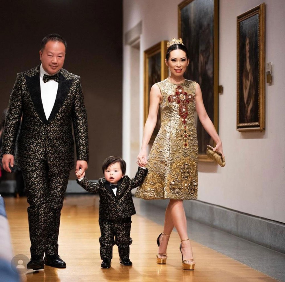 pChiu with her husband and son in the Dolce amp Gabbana Alta Moda dress that featured in the Met's Heavenly Bodies...