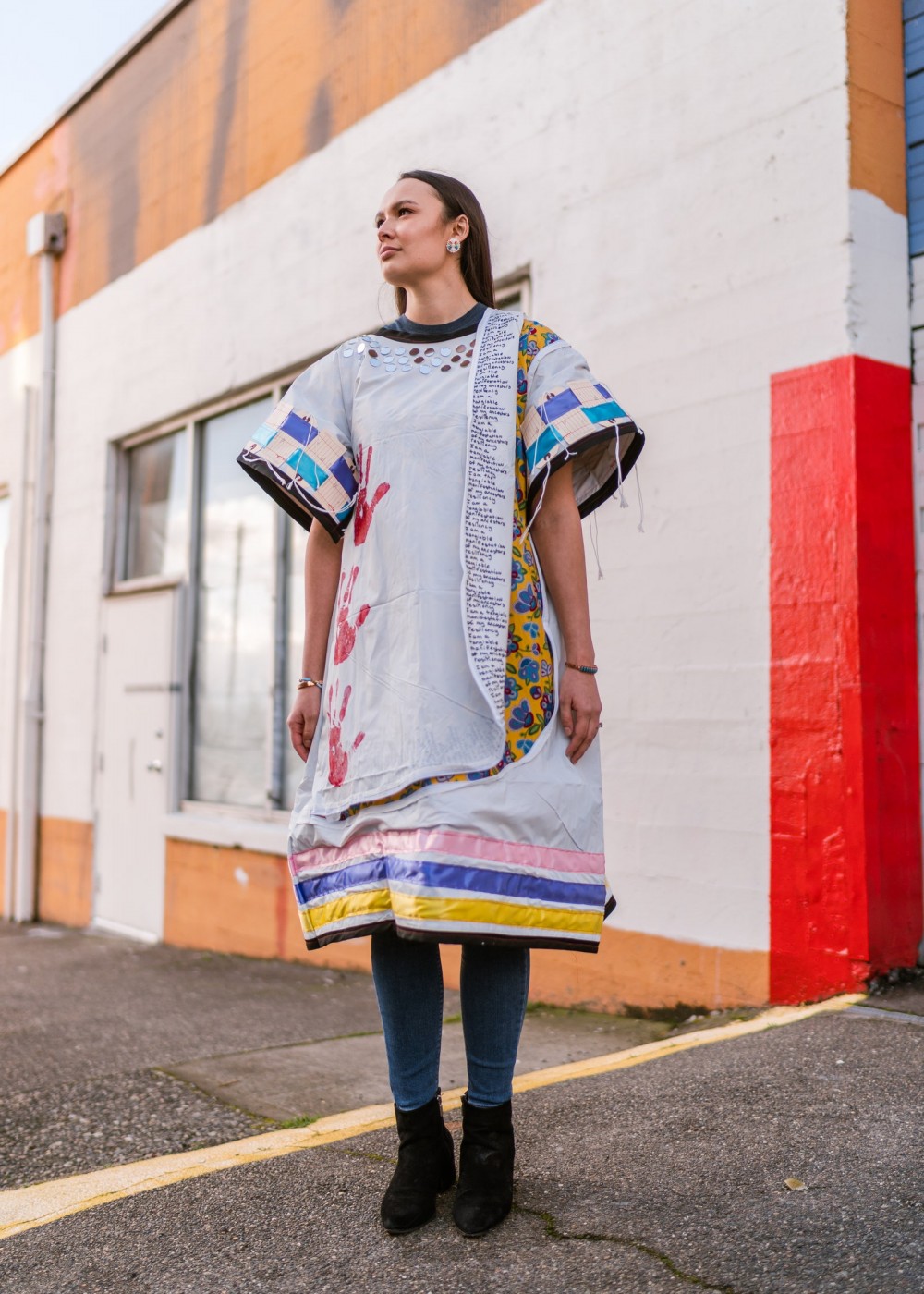 EchoHawk's dress worn by one of the staff members of the Urban Indian Health Institute.