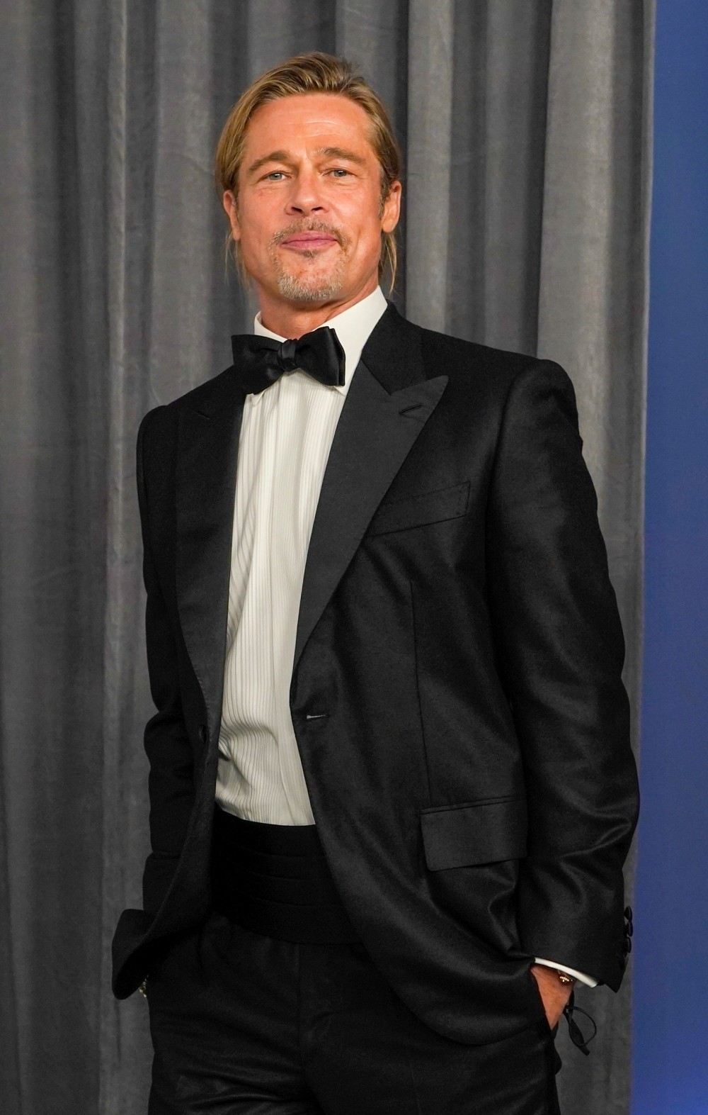 LOS ANGELES CALIFORNIA APRIL 25 Brad Pitt poses in the press room at the Oscars on Sunday April 25 2021 at Union...