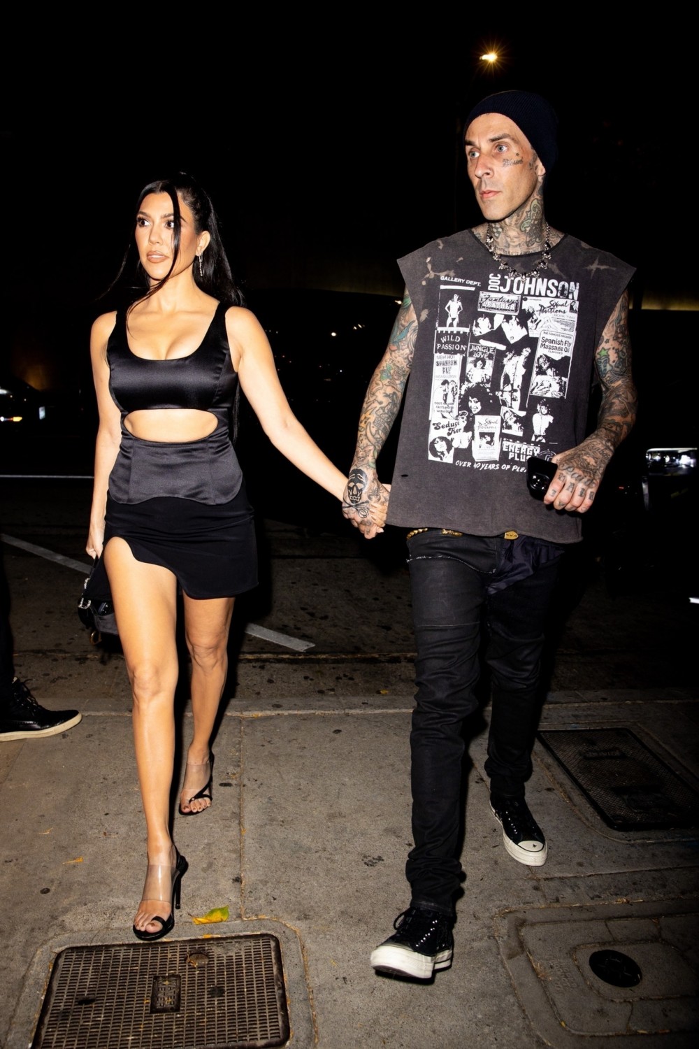 Image may contain Travis Barker Clothing Apparel Skin Human Person Footwear Shoe and Sleeve
