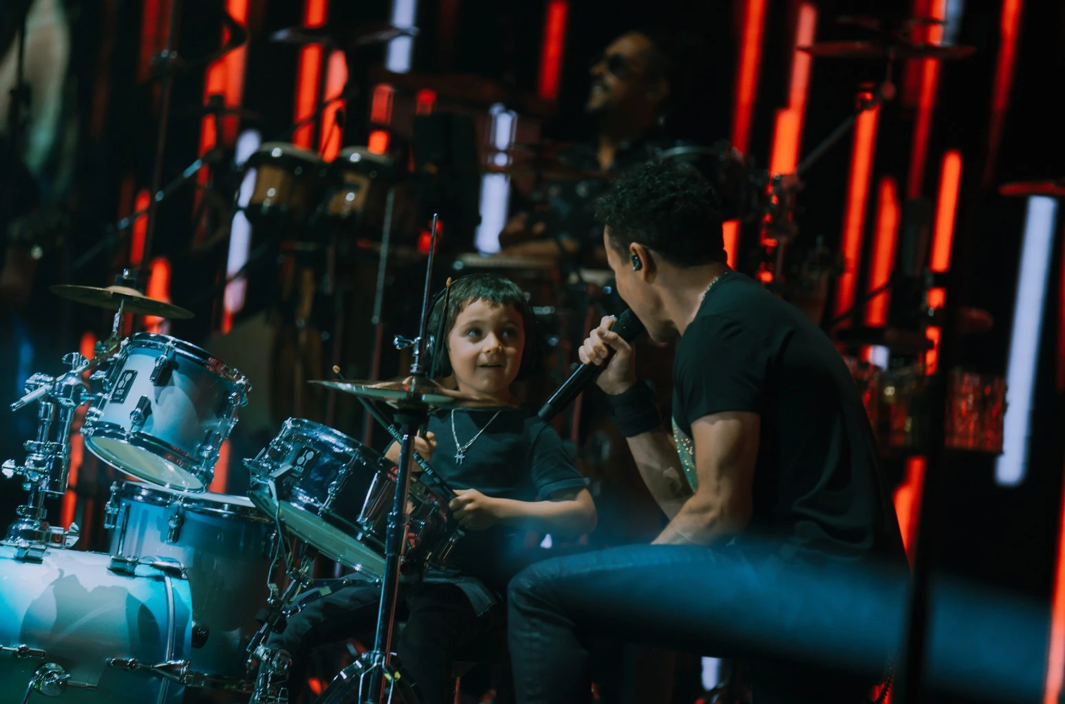 Fonseca performing with his son