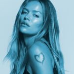 Karol G Embraces Intimacy on New Album 'No Me Arrepiento de Sentir Tanto'